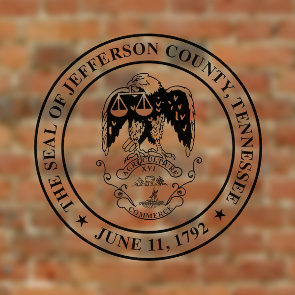 seal of jefferson county tennessee overlayed on a brick background